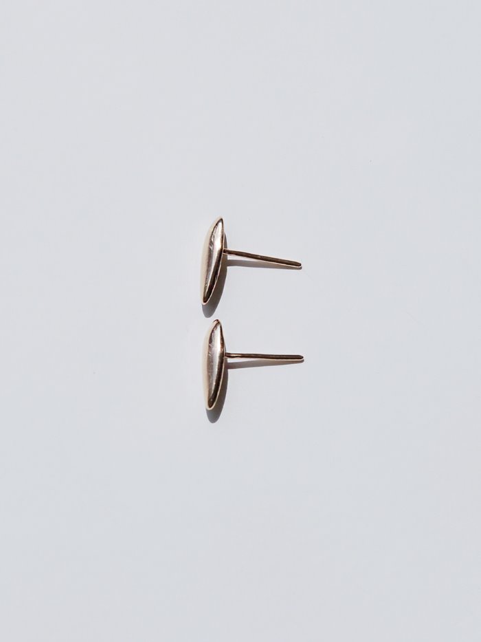tiny oval gold earring