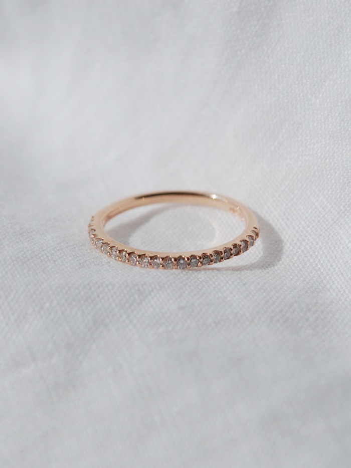 Thin half eternity diamond ring