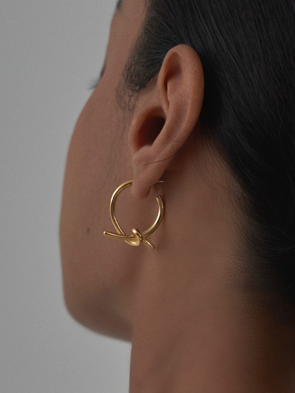 My twist gold tone earring